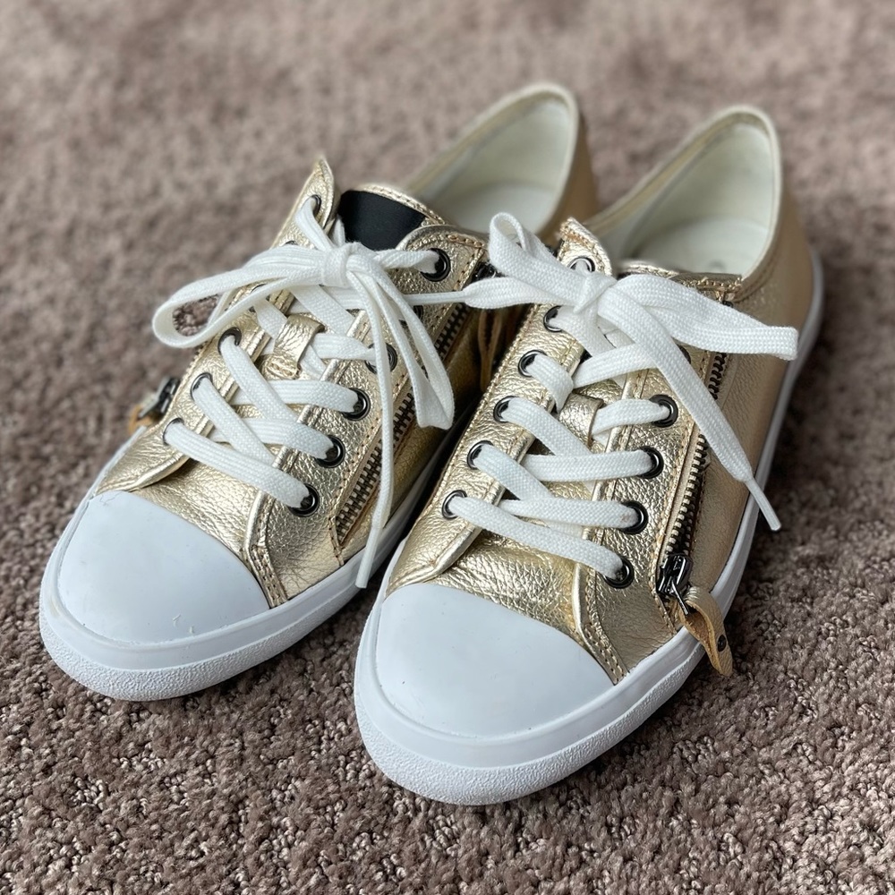 COACH women’s gold zipper sneakers